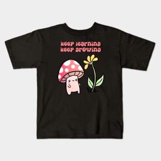 Keep learning keep growing a cute mushroom with a flower Kids T-Shirt